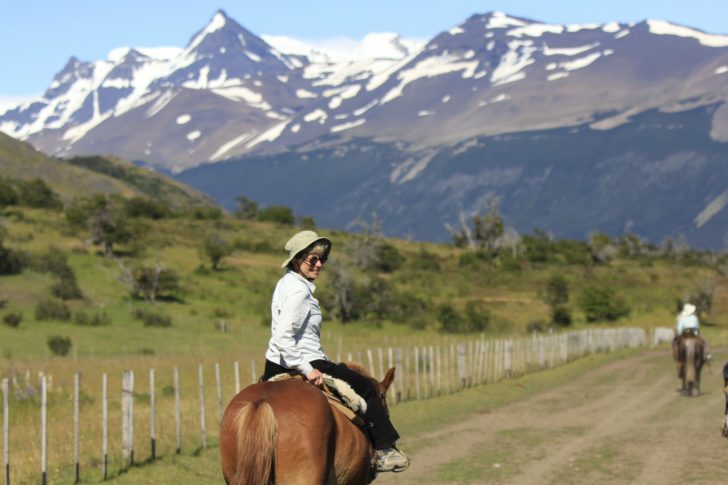 Traveler riding through the Andes