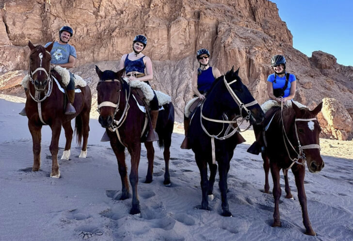 Knowmad Adventures Photo Contest: Family horseback ride in the sand. 