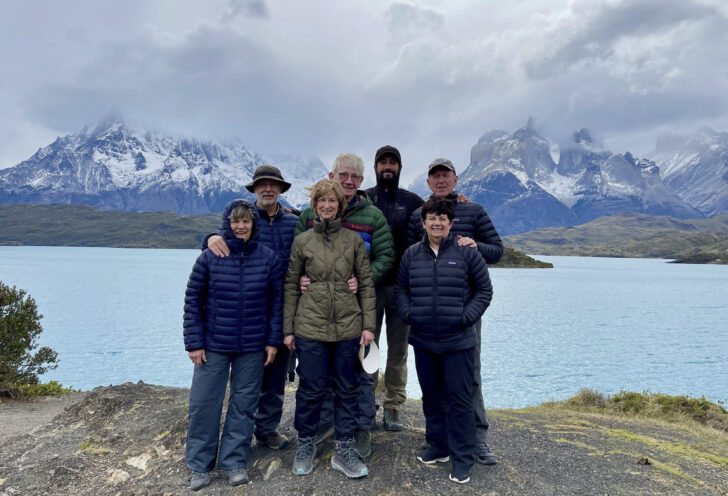 Knowmad Travlers pose in Torres del Paine National Park during their Antarctica and Patagonia exploration.