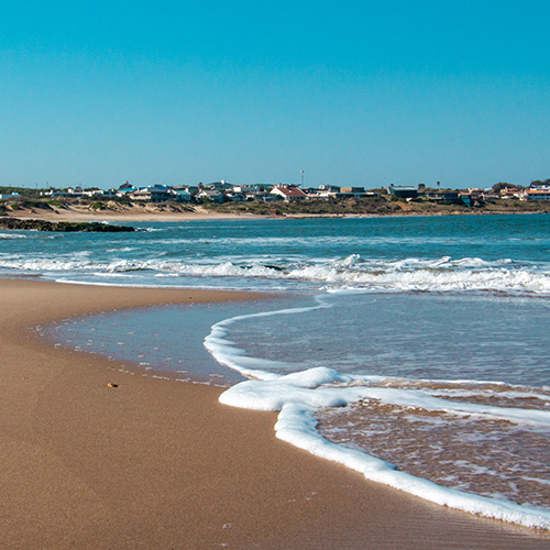 White sand beach in Jose Ignacio, Uruguay during a custom travel experience with Knowmad Adventures. 