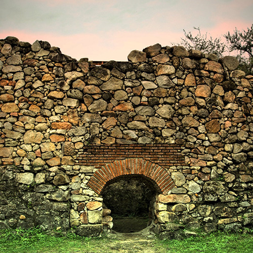 Stone colonial wall on a luxury Uruguay trip with Knowmad Adventures.