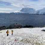 Knowmad travelers snap photos during their Antarctica expedition cruise.