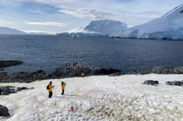 Knowmad travelers snap photos during their Antarctica expedition cruise.